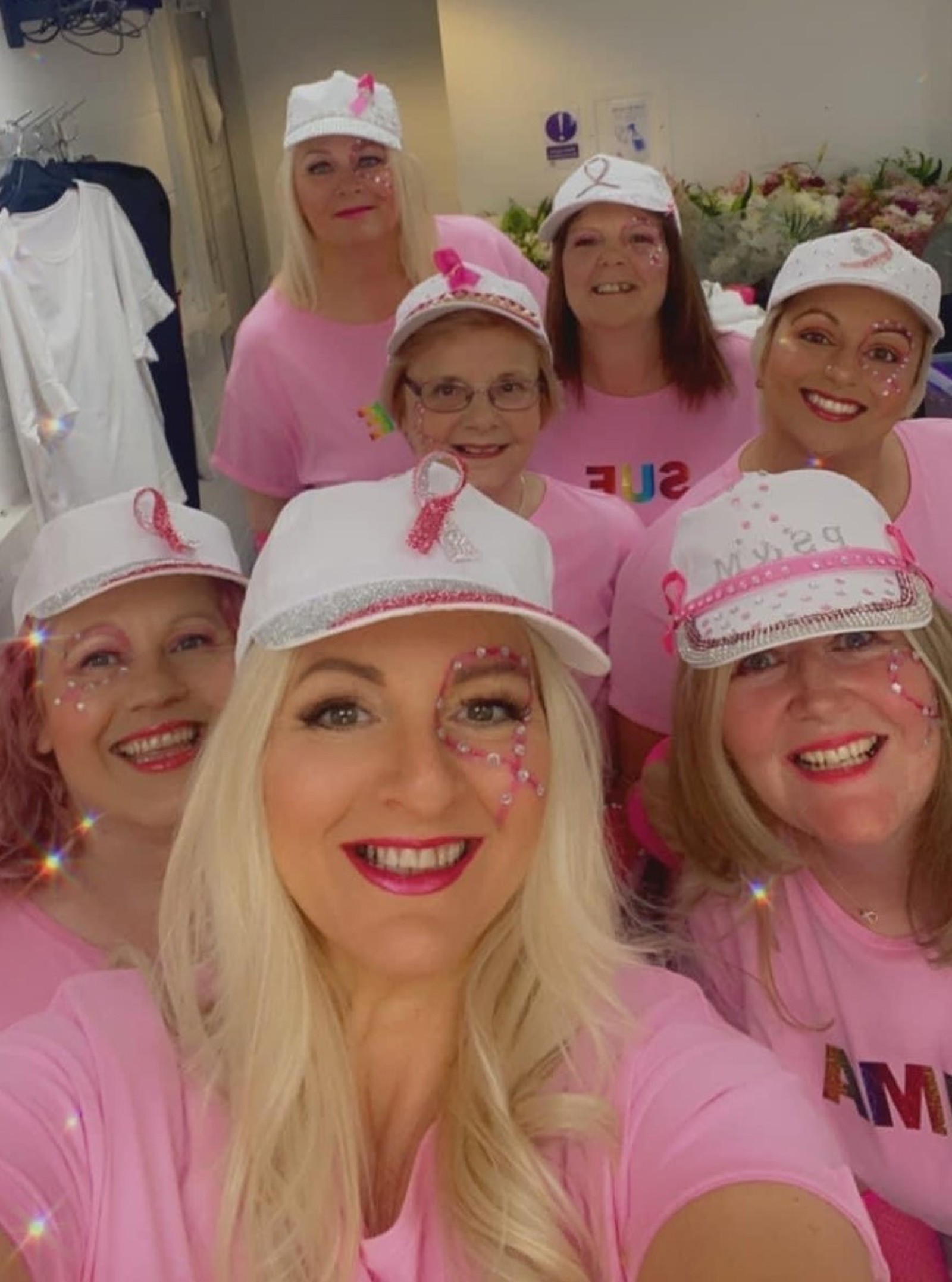 Group of Pink Sisters And Misters Fundraisers in pink tshirts