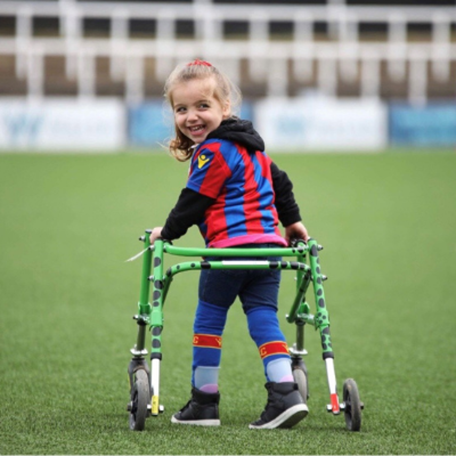 Lilac with walker at local football club